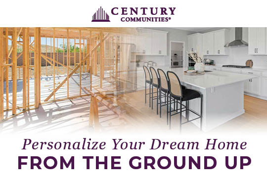 A kitchen with a table and chairs.