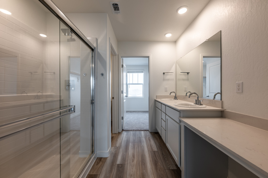 A bathroom with a glass shower.
