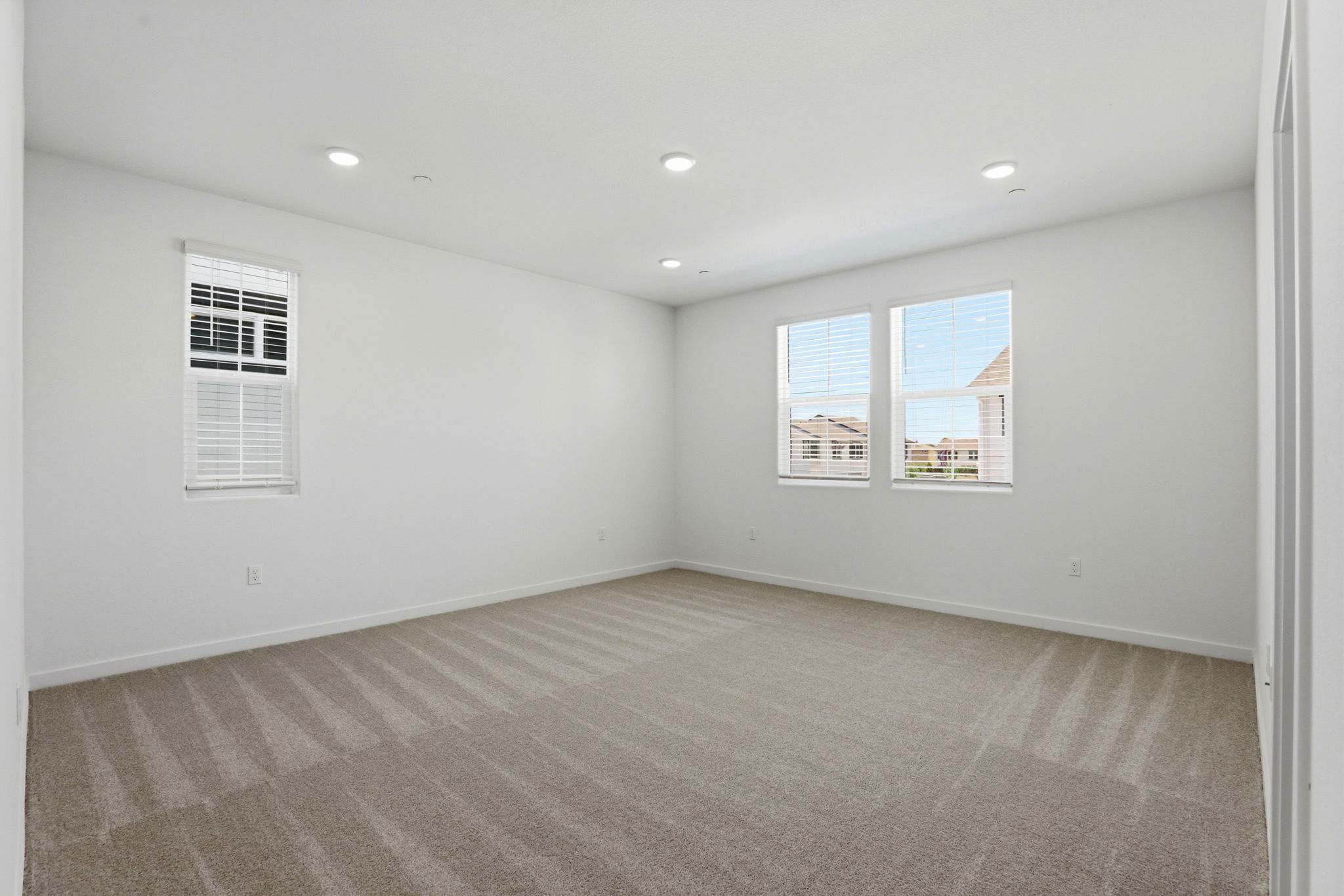 A room with a few windows.