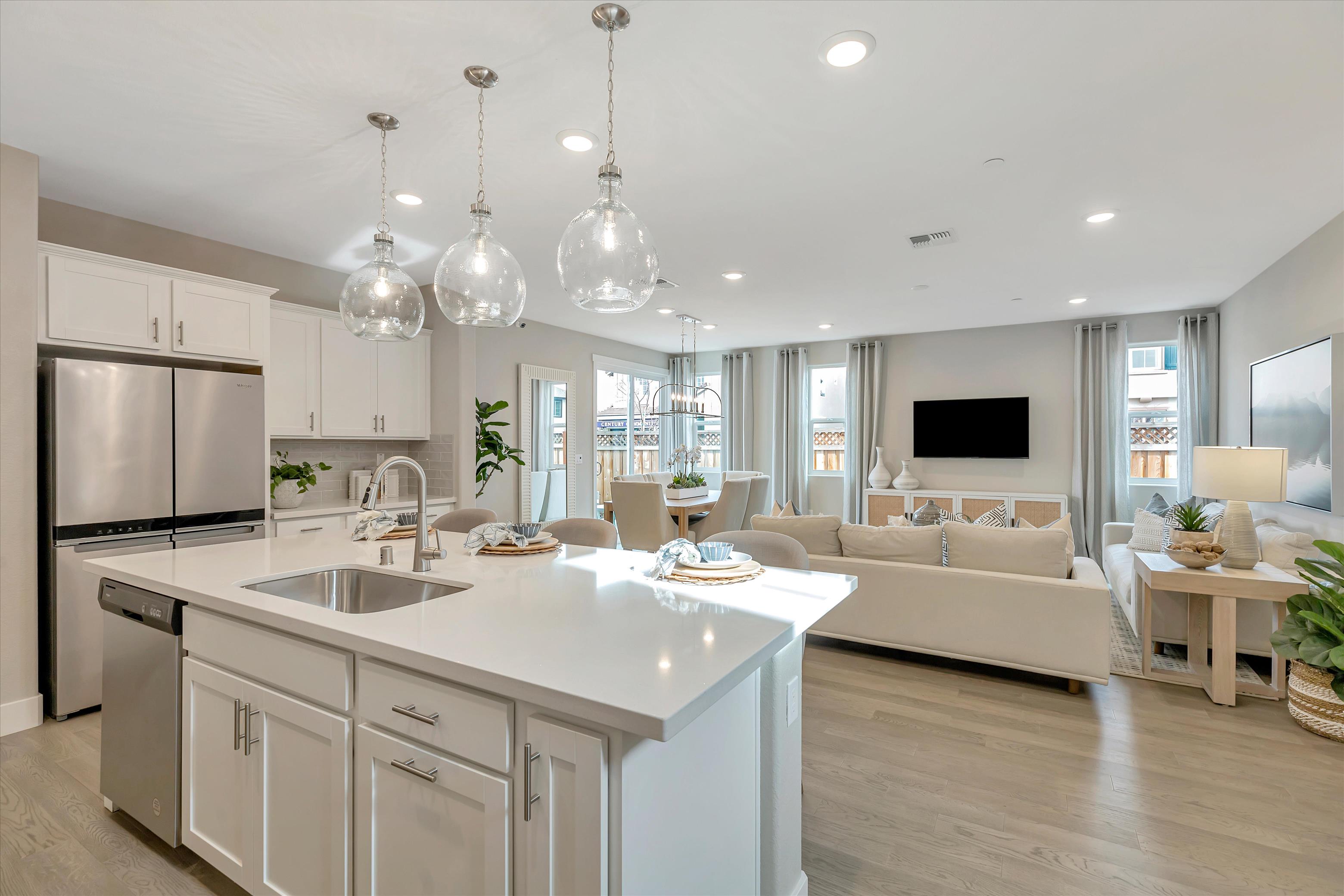 A kitchen with a tub and sink.