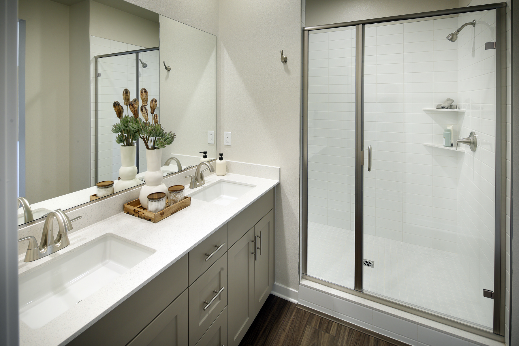 A bathroom with a glass shower.