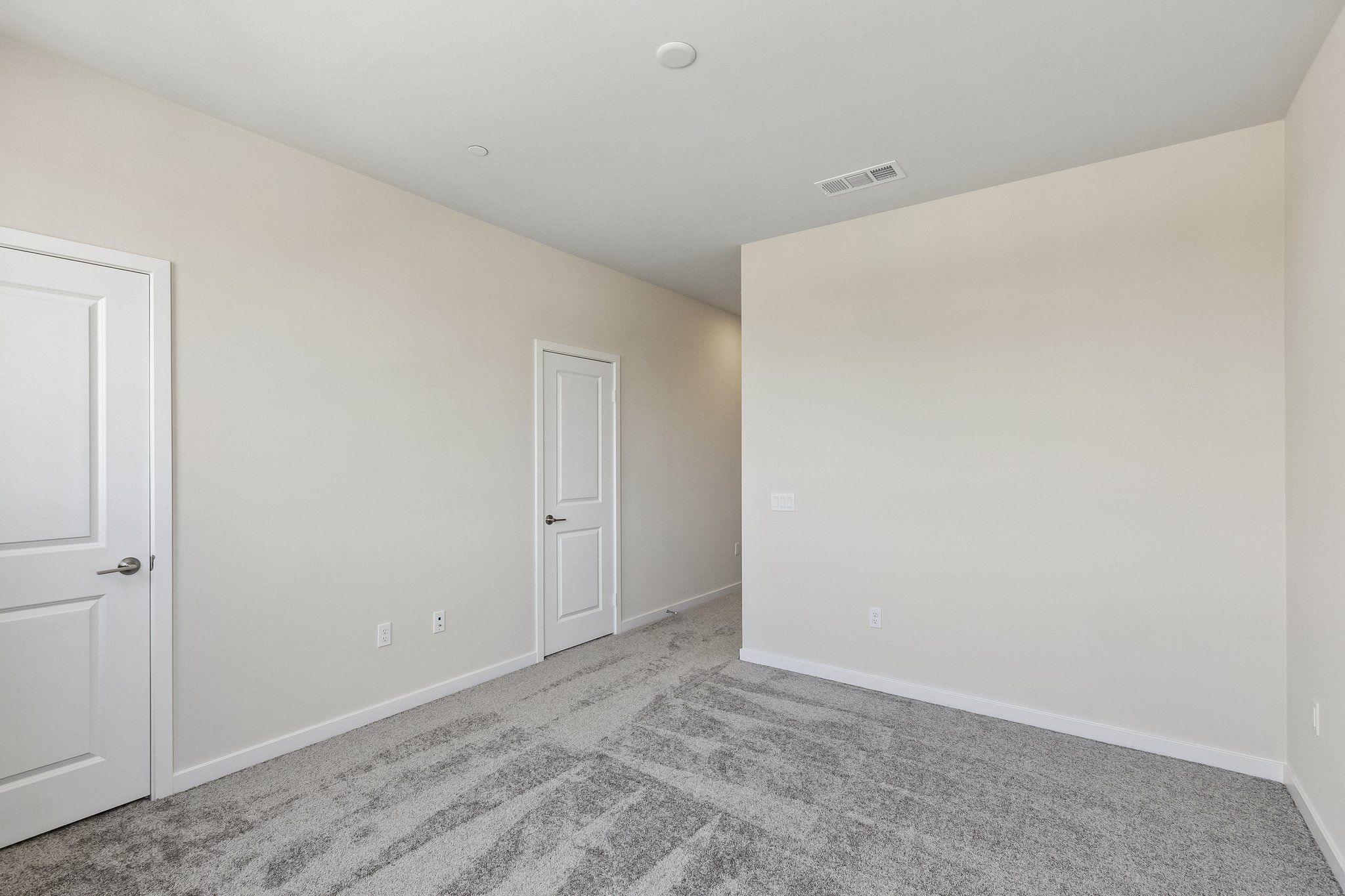A room with white doors.