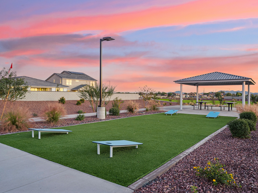 A park with benches and a gazebo.