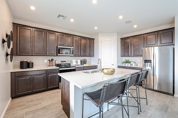 A kitchen with a large island.
