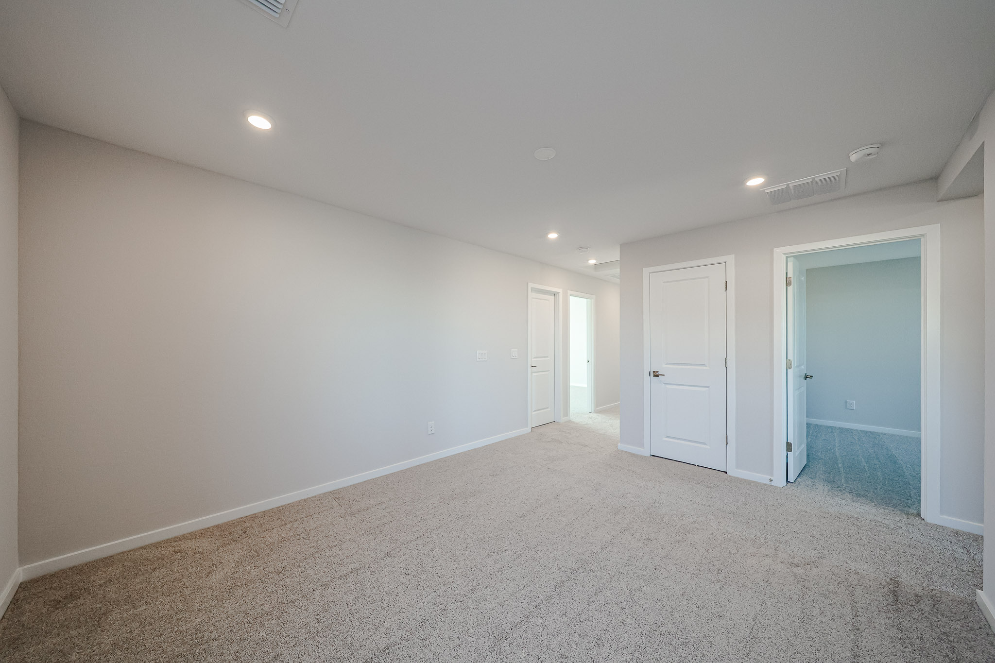 A room with white doors.