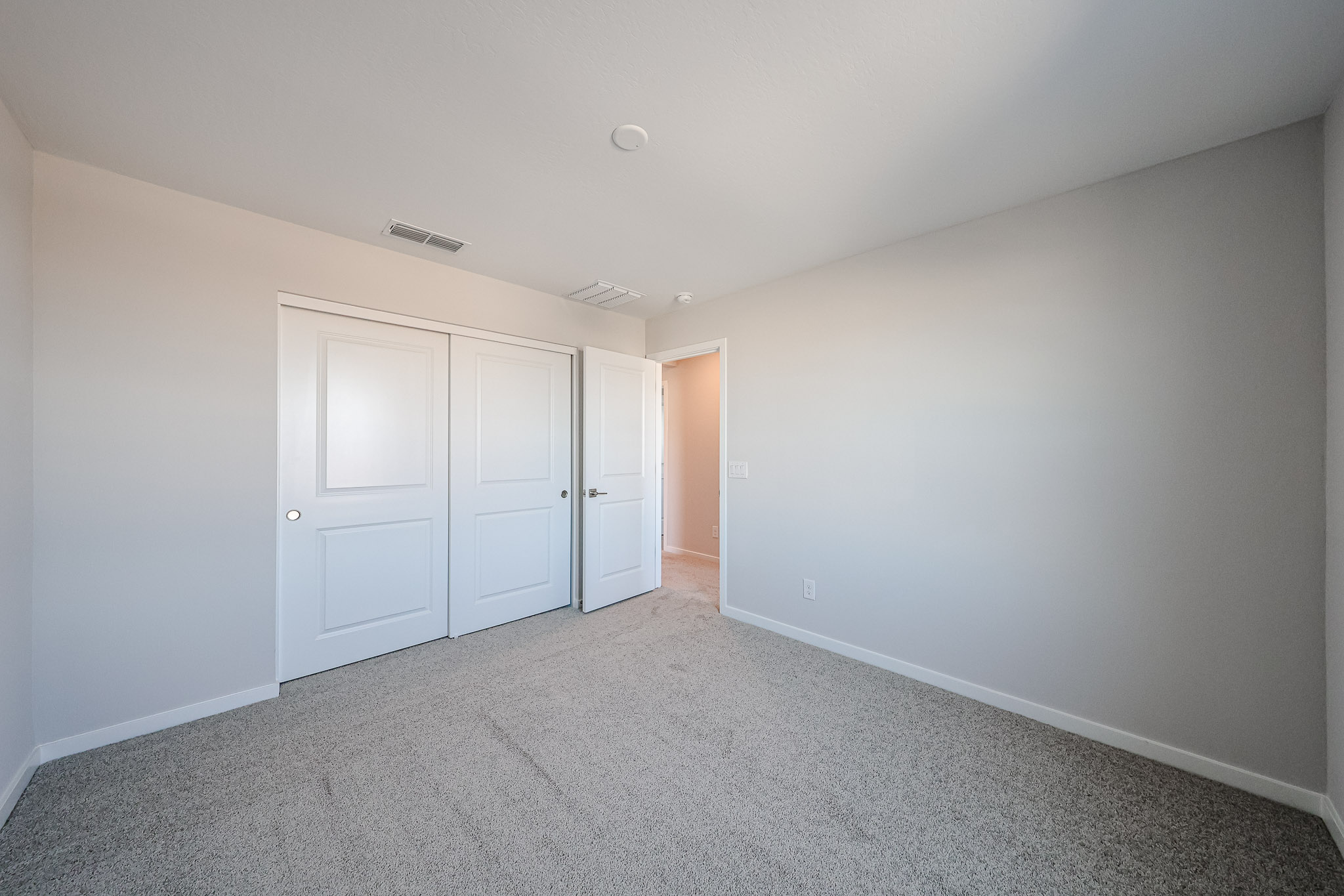 A room with white doors.