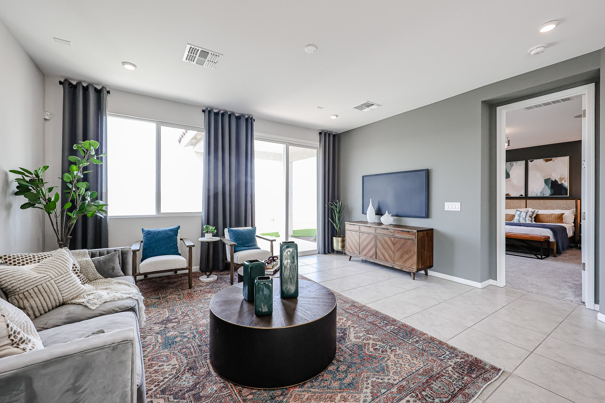 A living room with a large window.