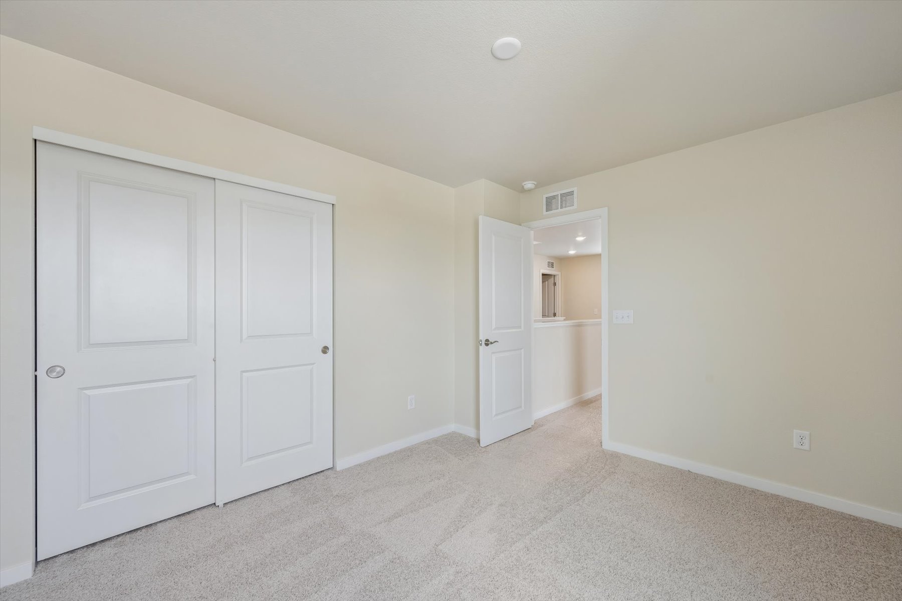 A room with white doors.