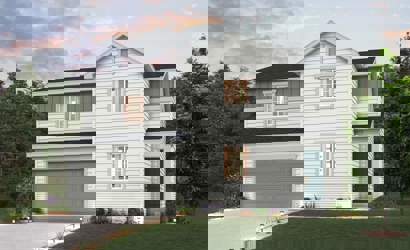 A white house with a garage.