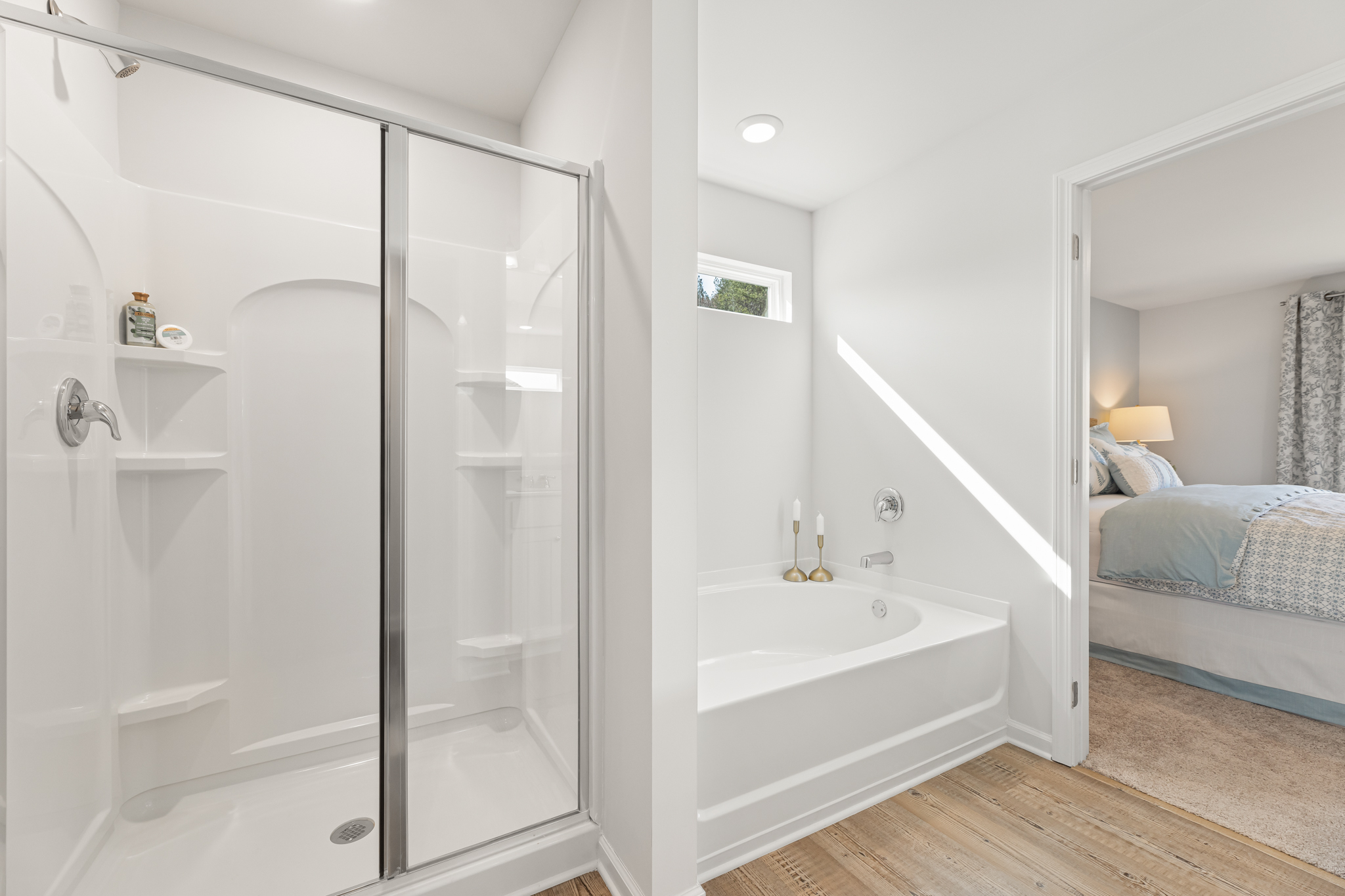 A bathroom with a glass shower.