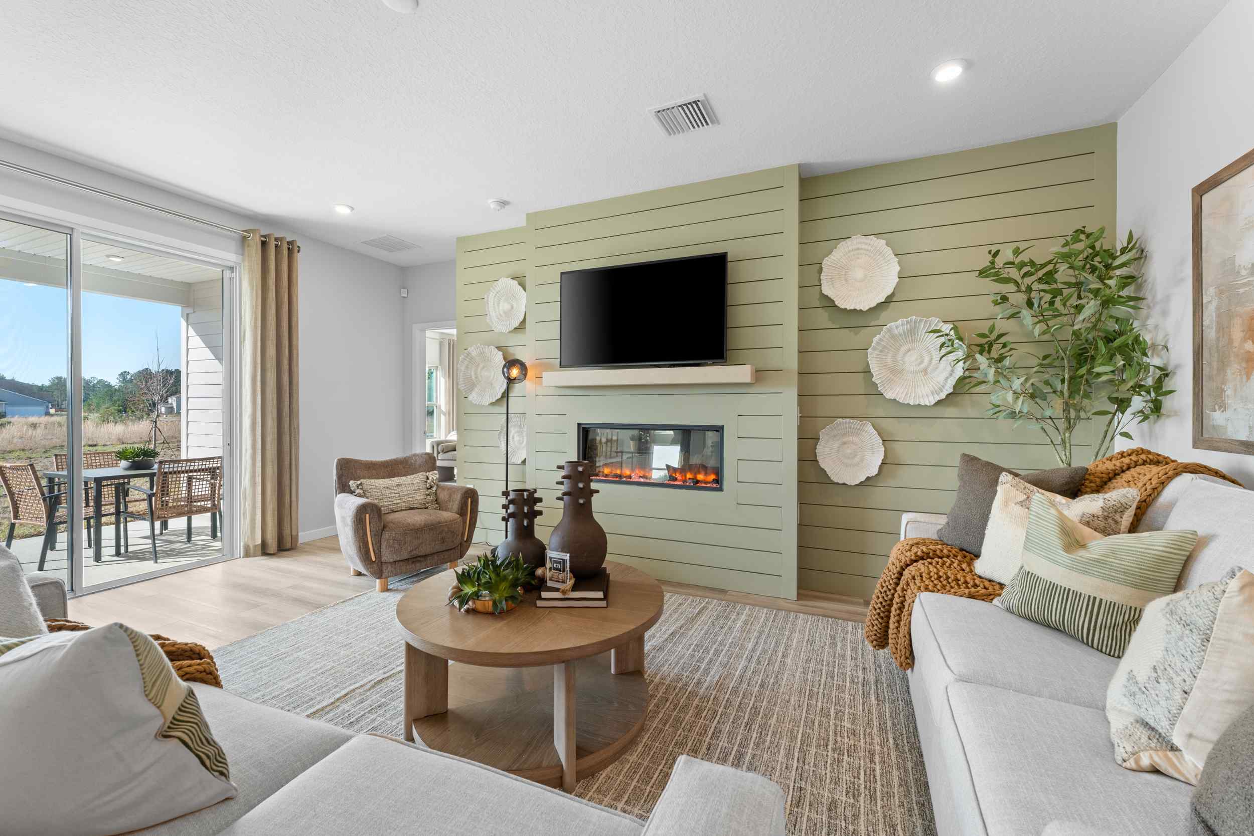 A living room with a fireplace.