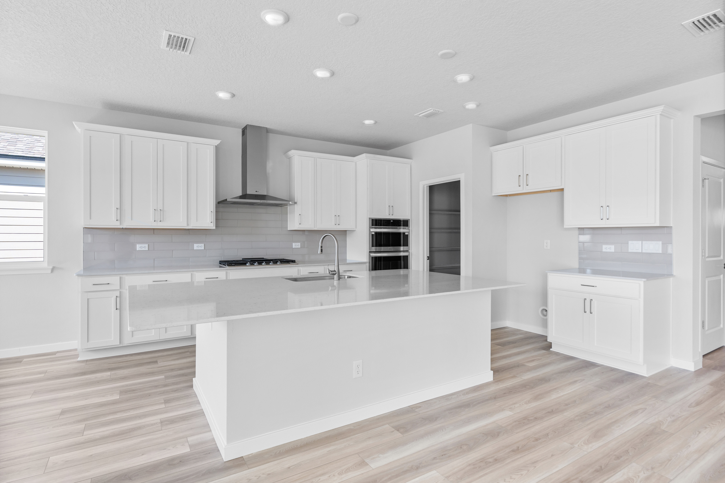 Lot 199 Chef's Kitchen with Large island at Reserve East