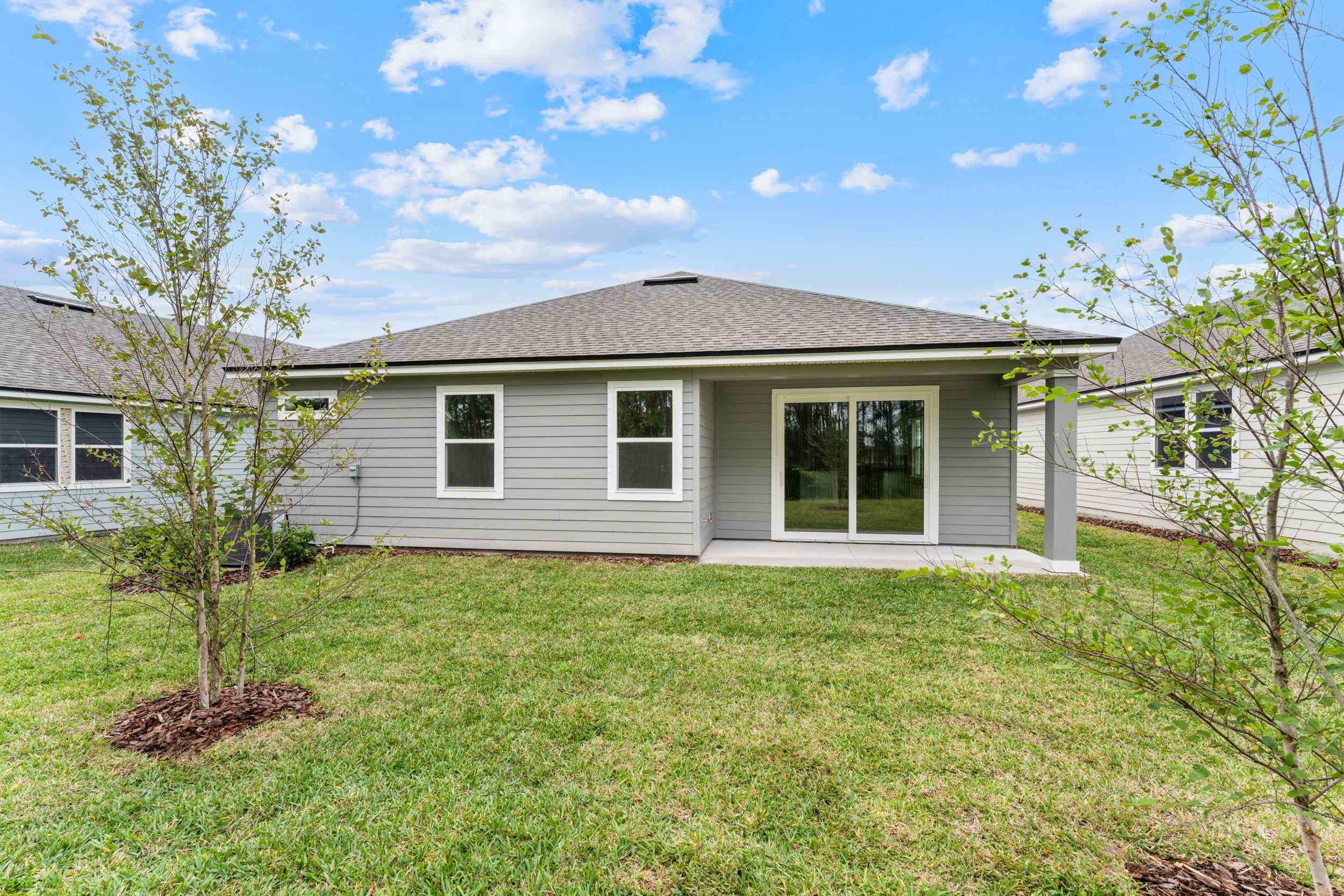 Lot 216 Rear Exterior with Covered Patio at Reserve East in Flagler Beach