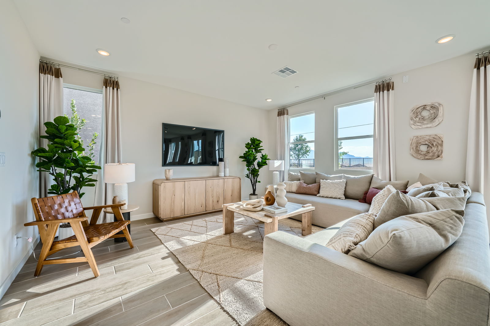 A living room with a large window.