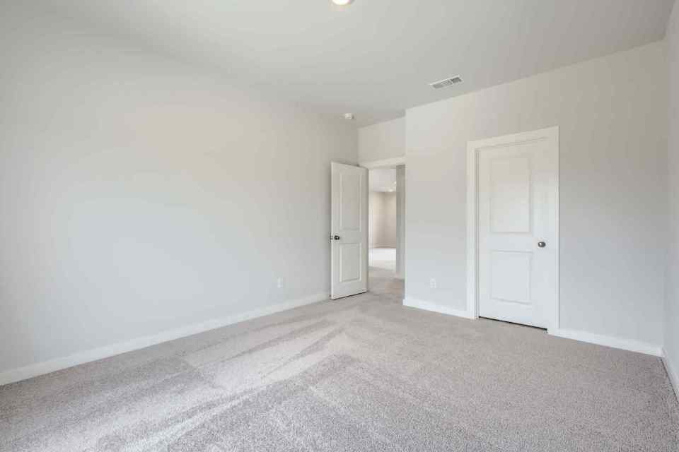 A room with white doors.