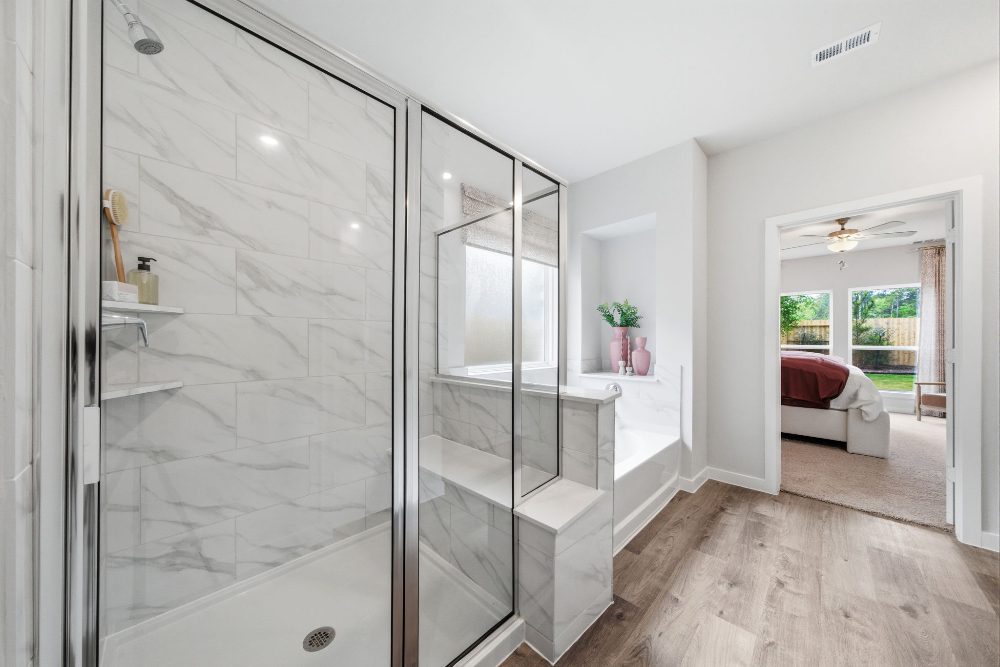 A bathroom with a glass shower.