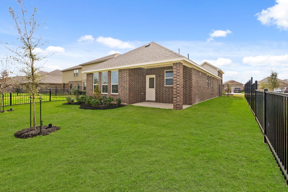 A house with a fence around it.