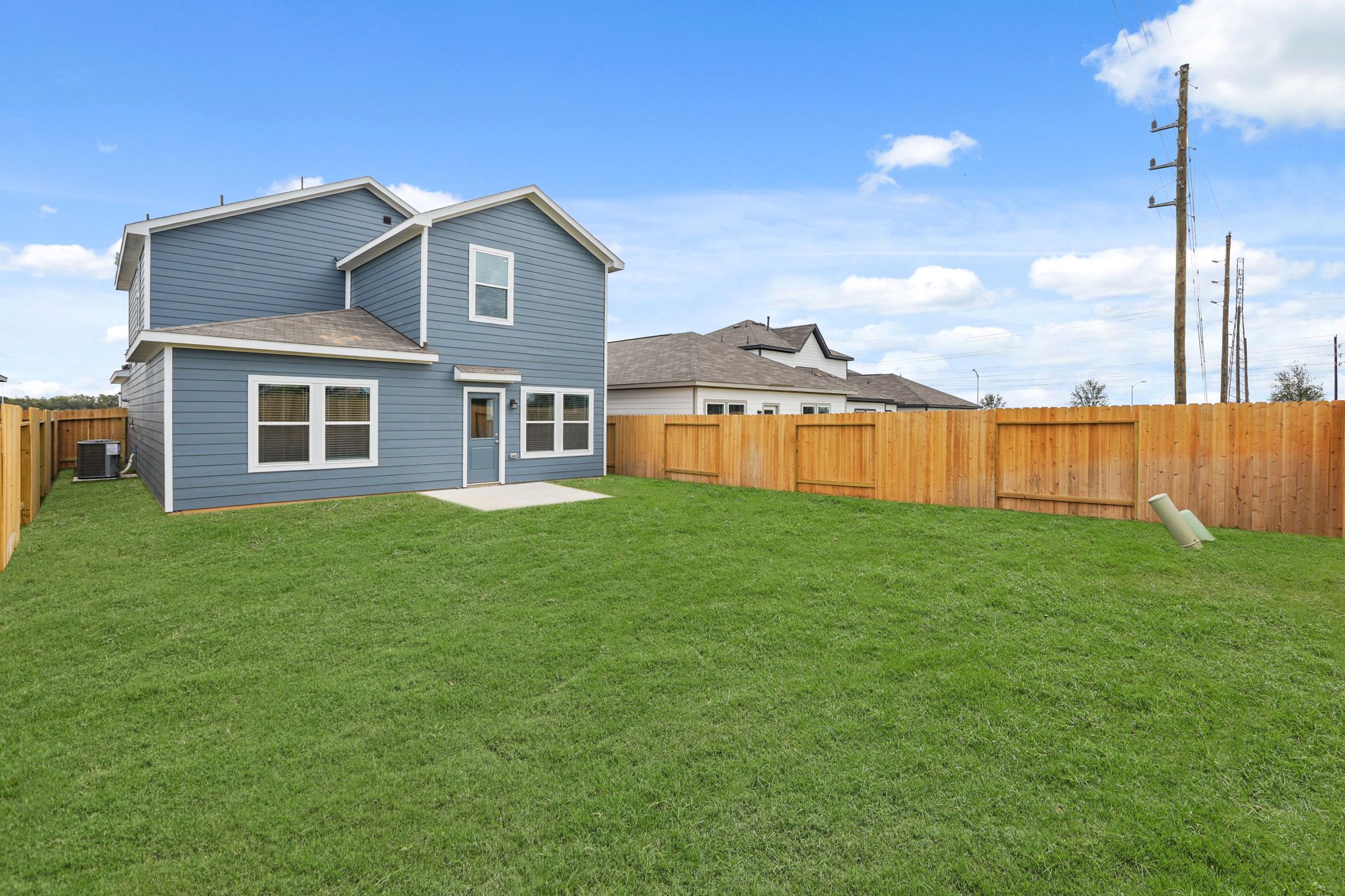 A house with a fence around it.