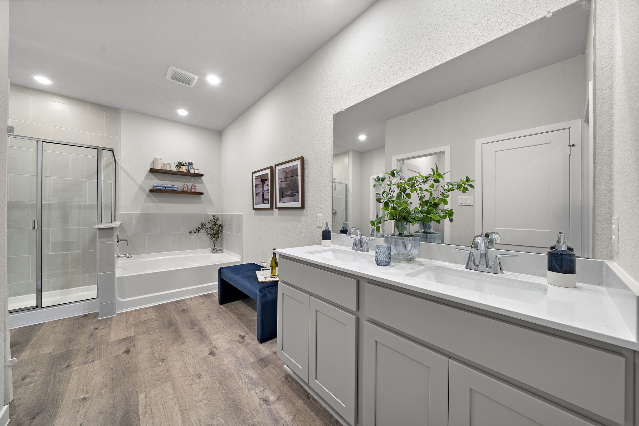 A bathroom with a tub and sink.