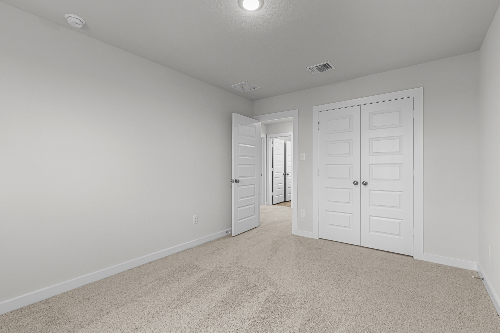 A room with white doors.