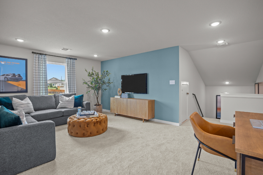 A living room with a tv and couches.