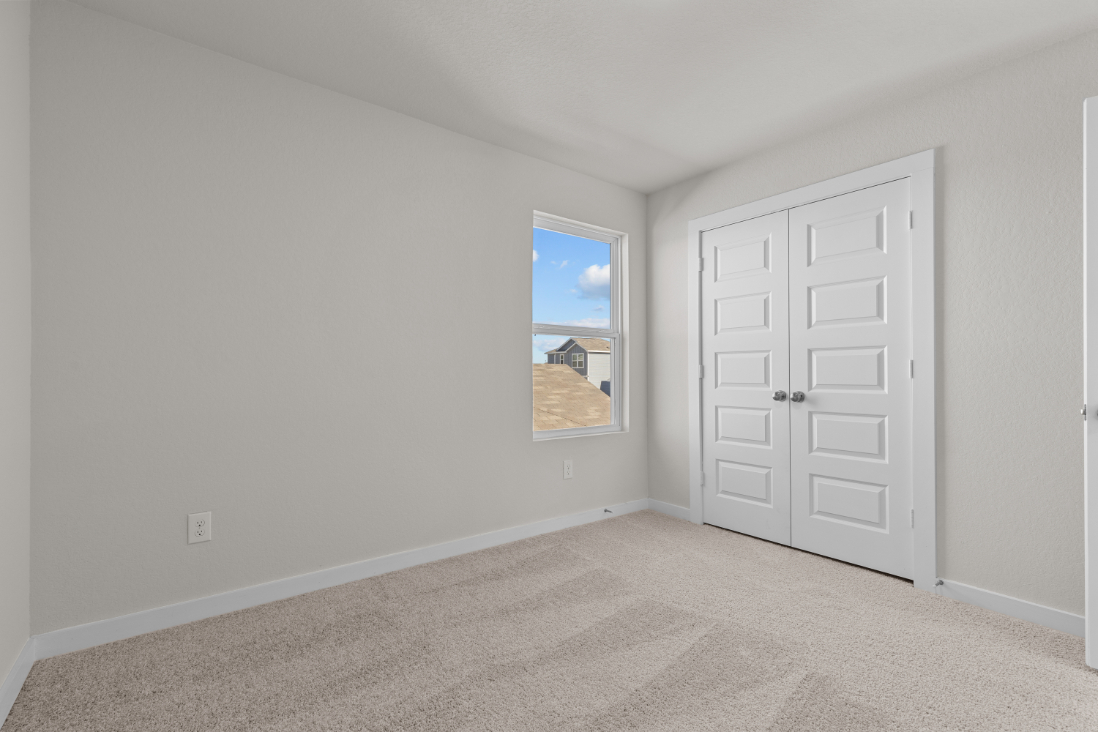 A room with white doors.