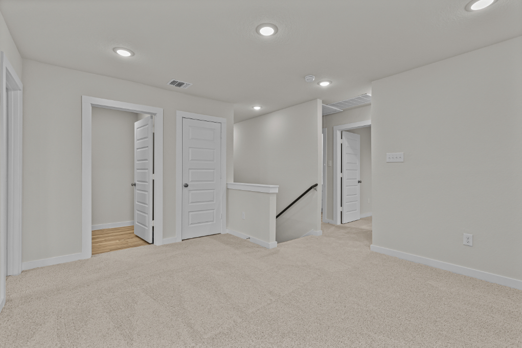 A room with white doors.