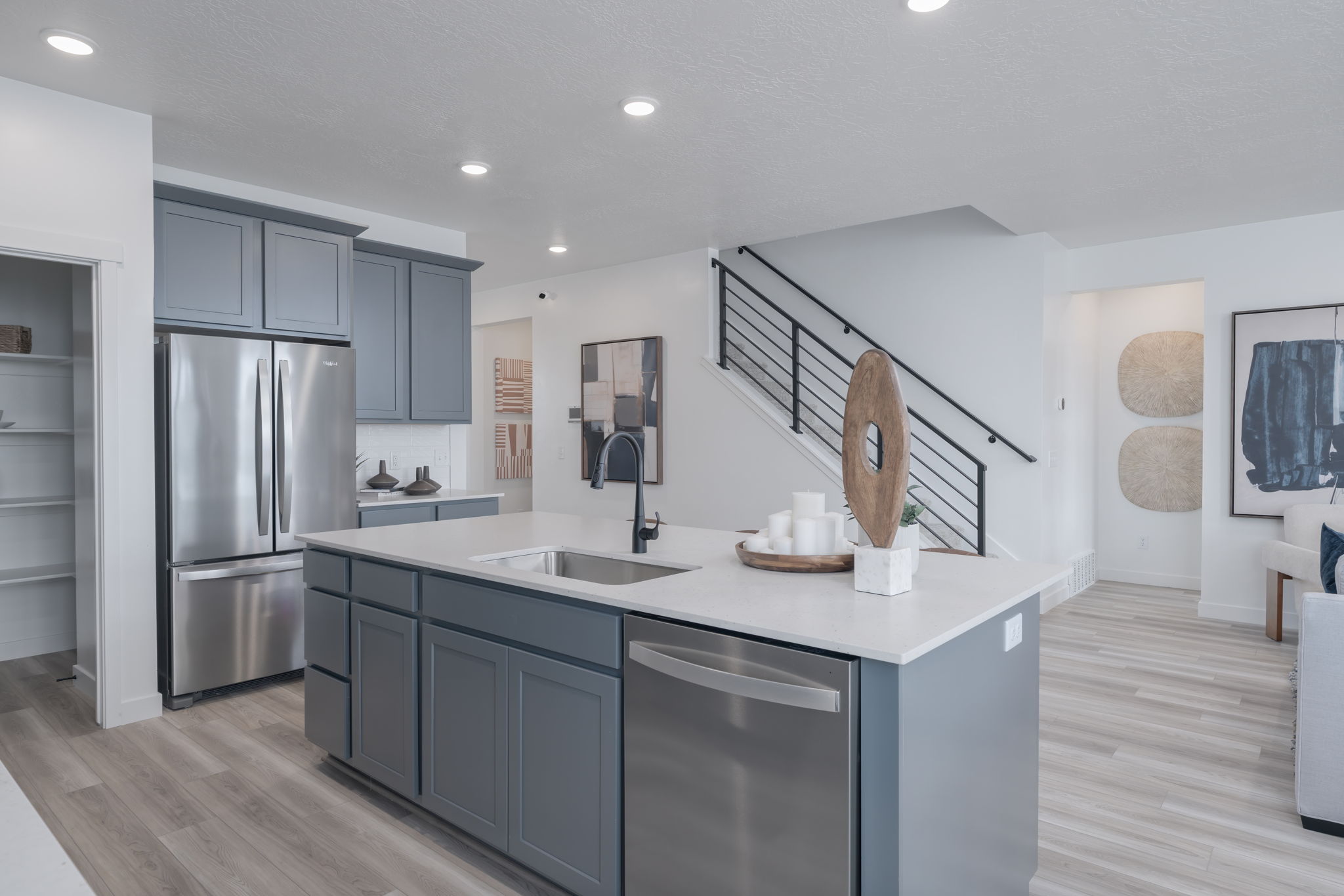 A kitchen with stainless steel appliances.