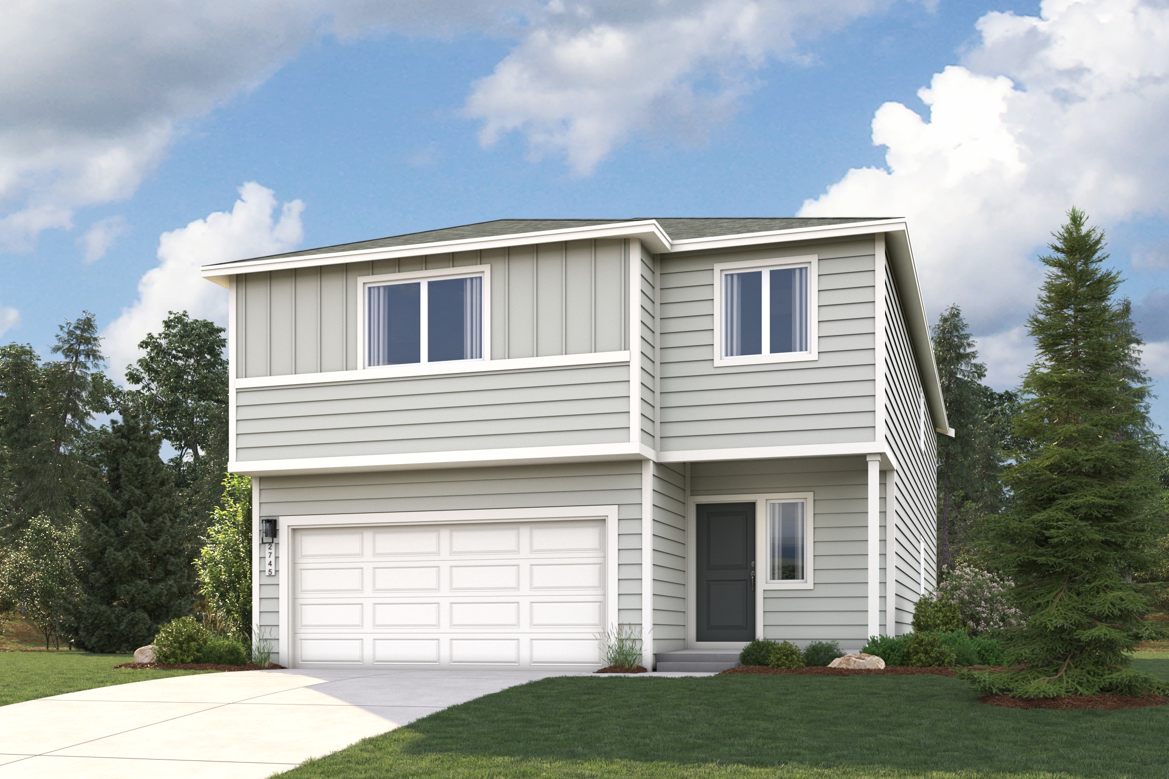 A white house with a garage.