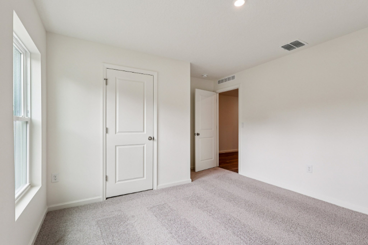 A room with white doors.