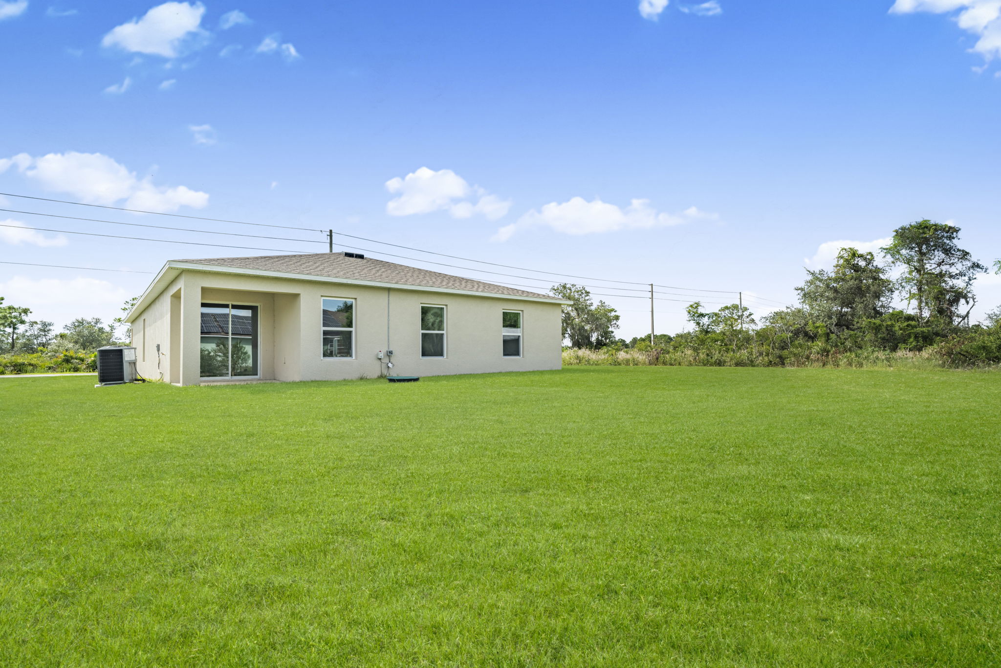A house with a grass yard.