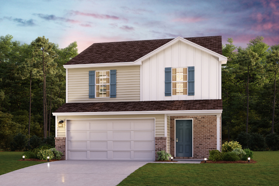 A house with a driveway and trees.