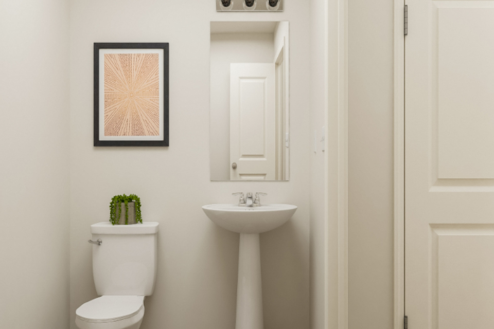 A bathroom with a sink and toilet.